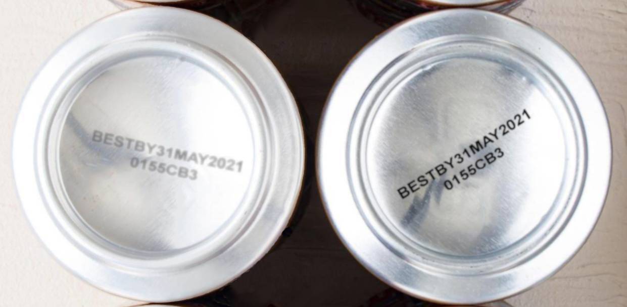 Image of aluminum cans comparing quality of printing