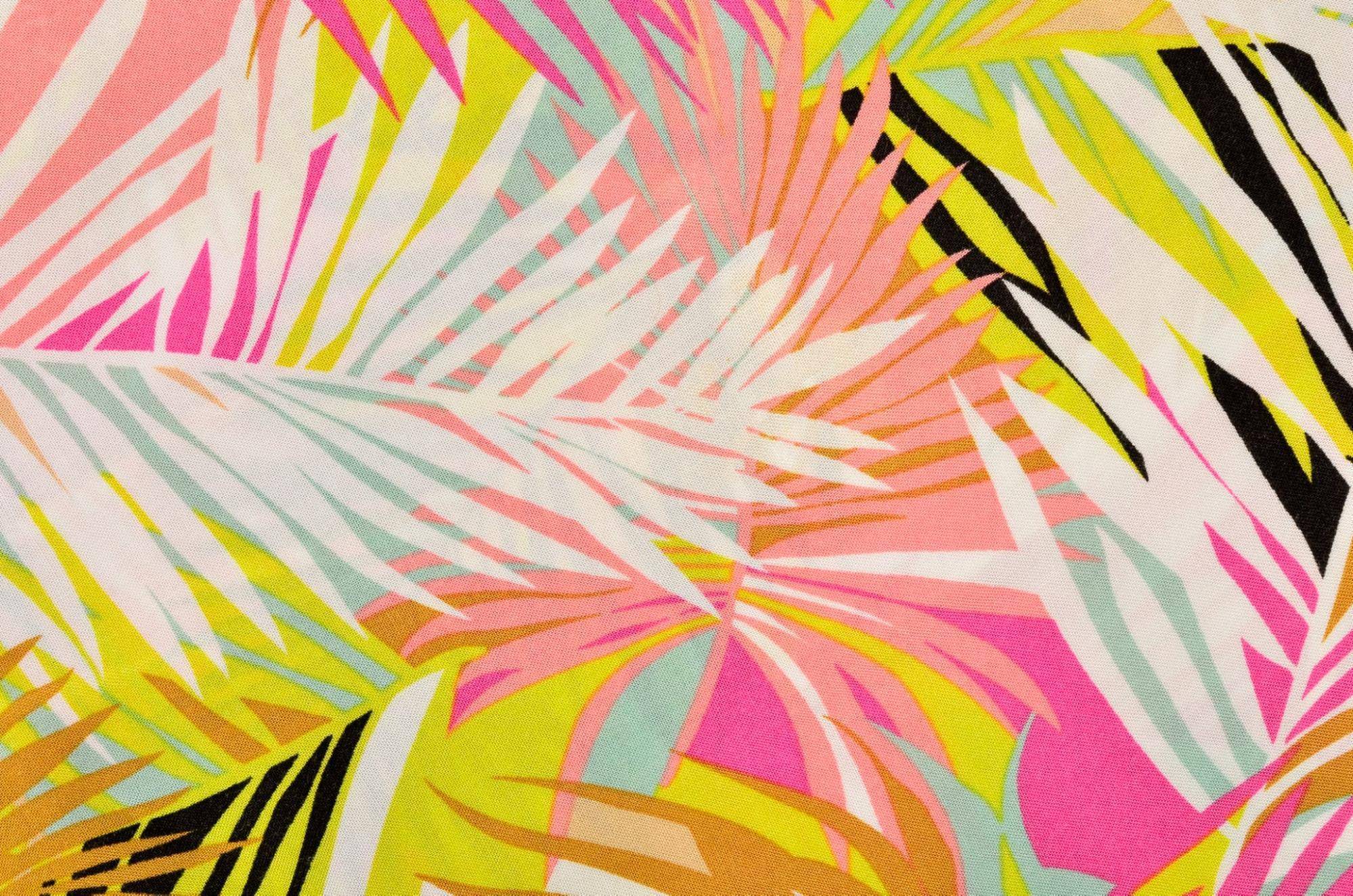 bright colorful palm leaves printed on fabric in multiple colors