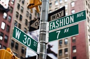new york city street sign for fashion district weat 30th and 7th avenue