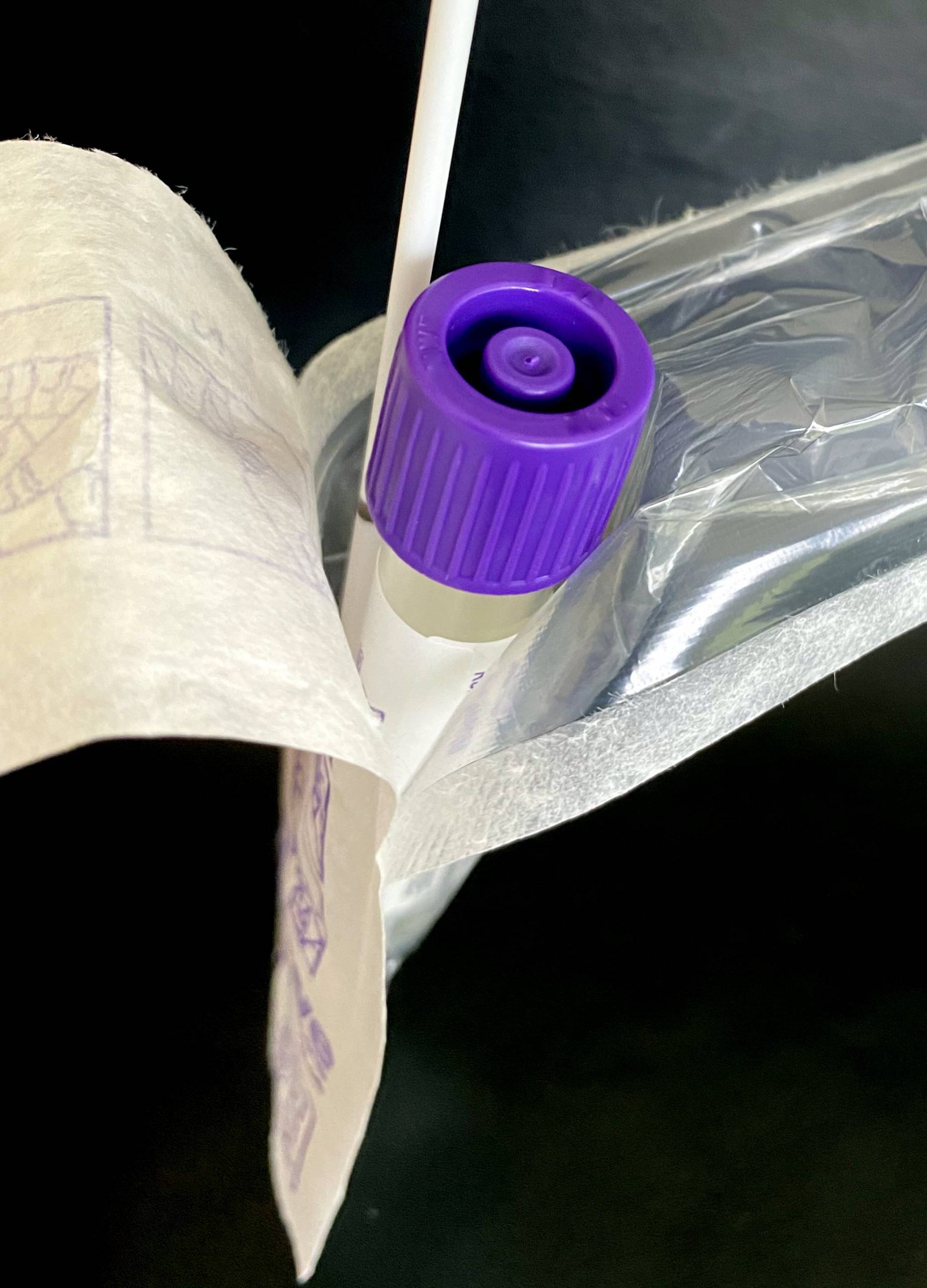 Opened medical test packaged in plastic and synthetic paper