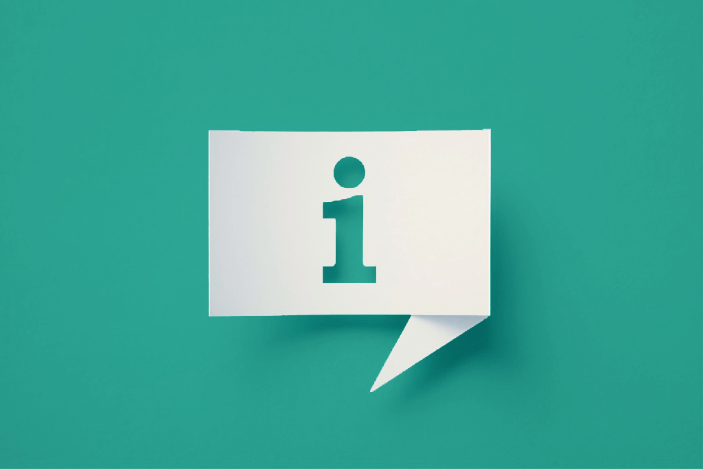 a green, lowercase i in the middle of a speech bubble with a green gradient background